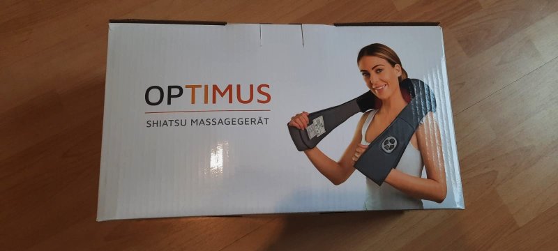 Die Verpackung des Optimus Massagegurts.